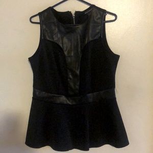 Black sleeveless blouse with faux leather accent